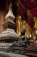 Laos: A small Buddha image behind the main Buddha image in the sim (ordination hall), Wat Mai Suwannaphumaham, Luang Prabang